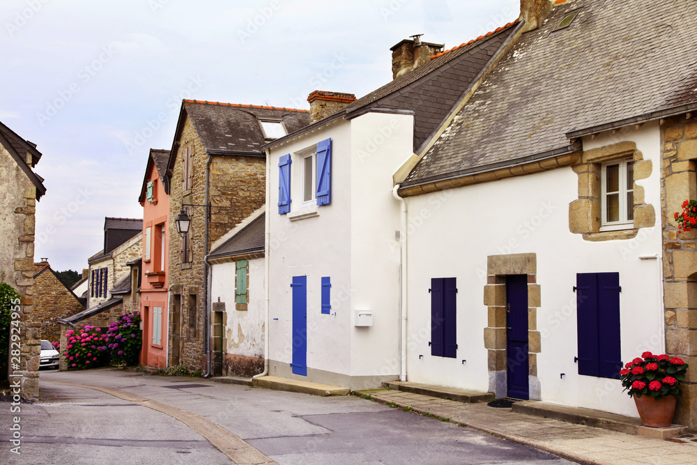 Narrow street and old little stone houses.