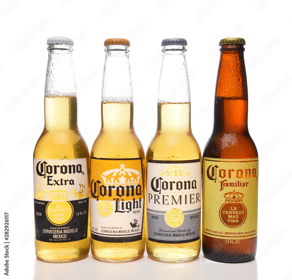 Stockfoto IRVINE, CALIFORNIA - APRIL 5, Four different bottles of Corona Beers, including, Extra, Light, Premier and Familiar. | Adobe Stock