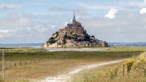 Wallpaper Mural Mont Saint Michel, an UNESCO world heritage site in France. Abbey, panoramic view. Normandy, Northern France, Europe.  Torontodigital.ca