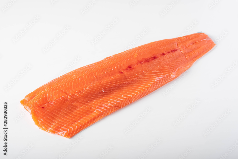isolated whole raw salmon fillet on white background