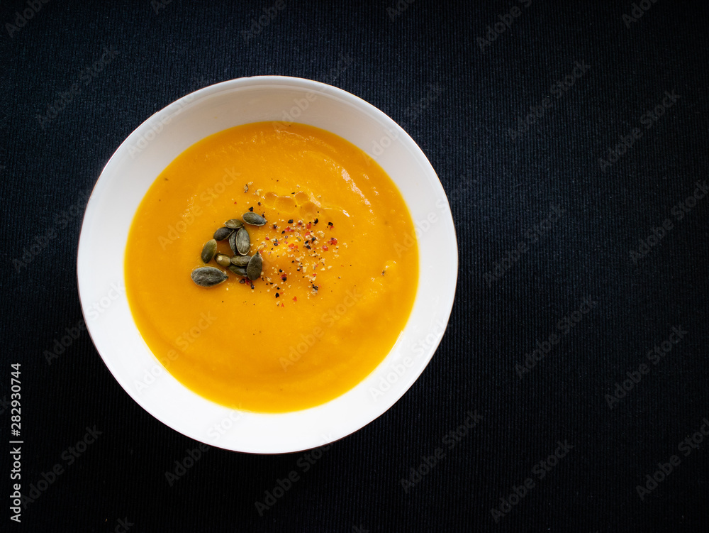 Vegetable cream isolated with carrot, pumpkin, onion and garlic Vegetable cream isolated with carrot, pumpkin, onion and garlic