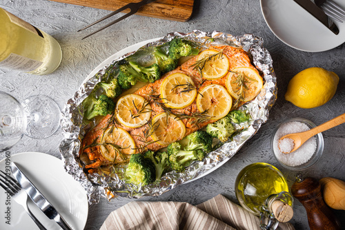 grilled whole salmon fillet with lemon and rosemarry