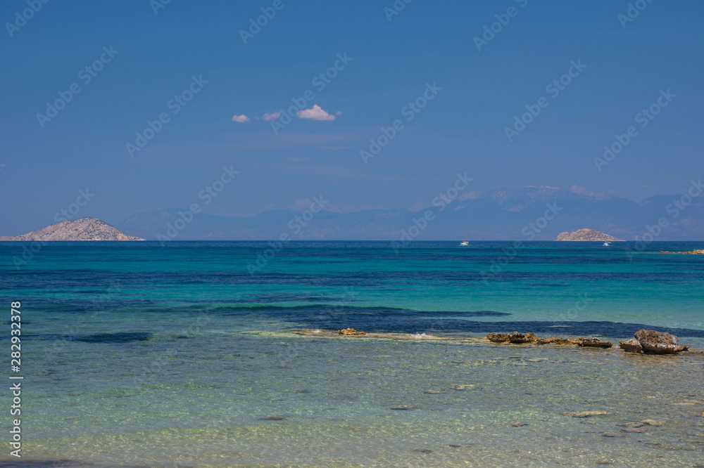 The clear and blue waters of Mediterranean sea in the Saronic gulf, Greece.