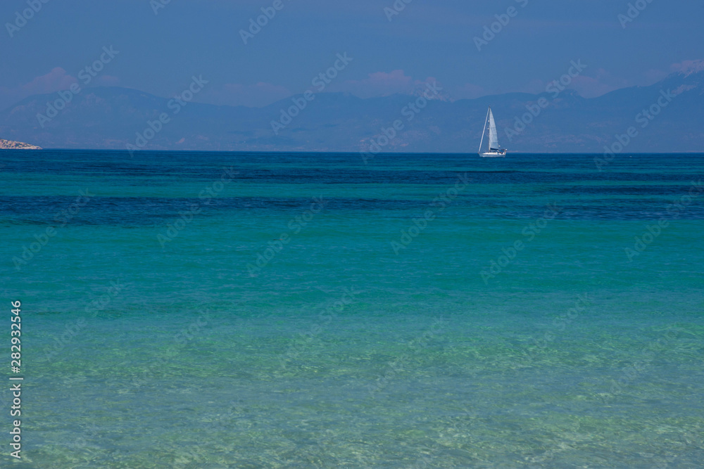 The clear and blue waters of Mediterranean sea in the Saronic gulf, Greece.