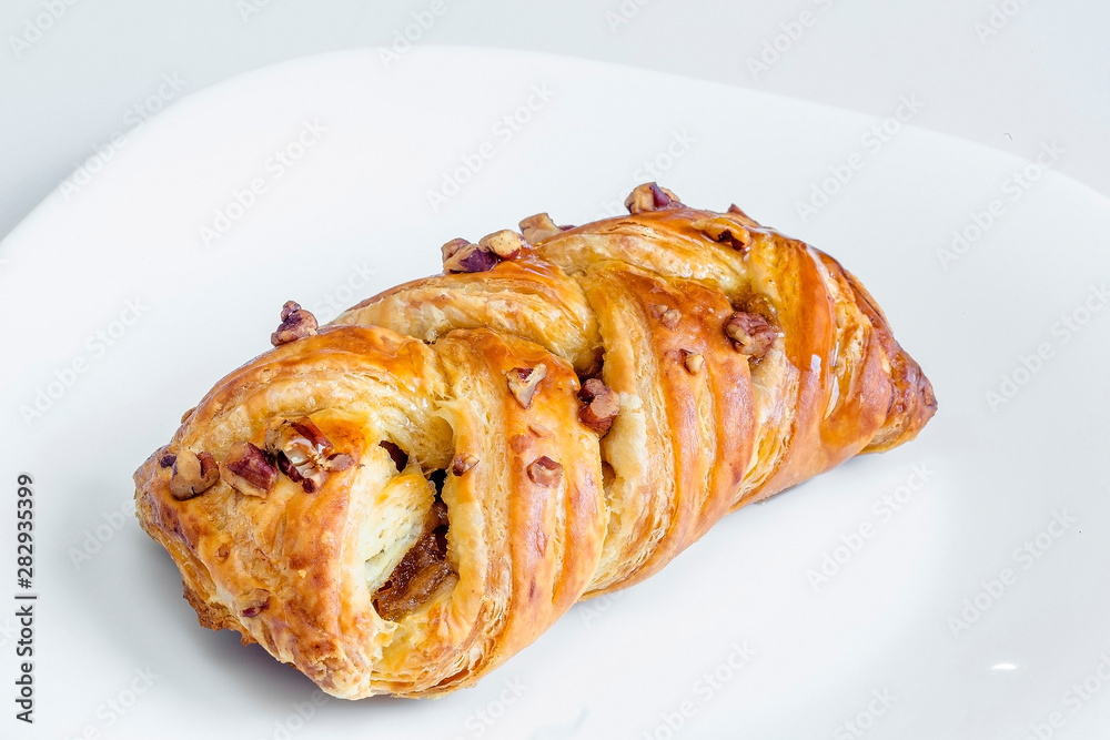 Plain croissant on white background Plain croissant on white background