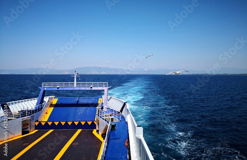Ferryboat on the sea.   Ferryboat in the Aegean Sea - Mediterranean Sea - Thassos, Greece.  photo
