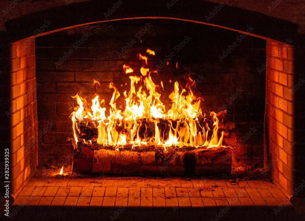 fire-in-a-fireplace-stock-photo-adobe-stock