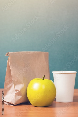 School lunch composition on chalkboard background photo