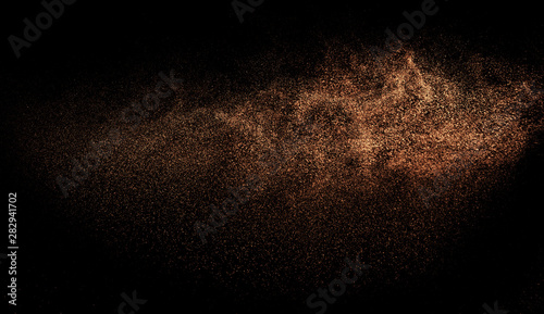 a shot from a firearm, an explosion of gunpowder on a black background, a bright flash with flying particles, abstract shape