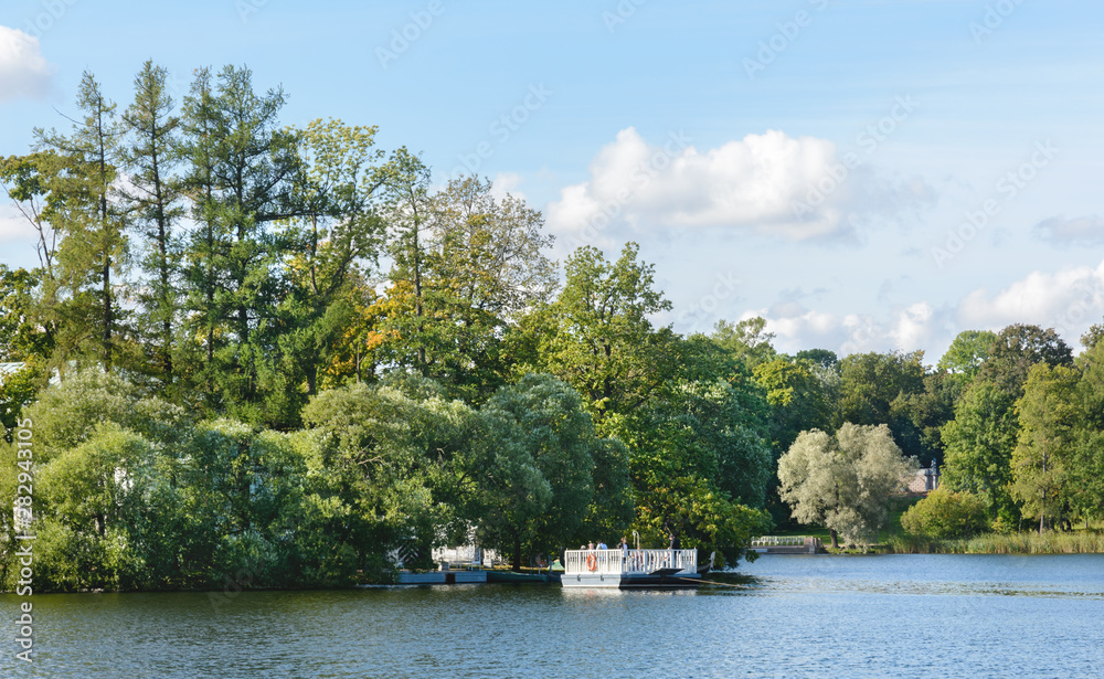 A ferry service connects the Hall on the Island pavilion with the Catherine Park.The marina stands on the north shore of the pond for ferry services to the island where the Hall on Island is located