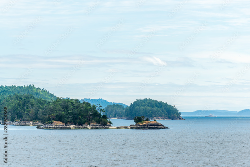View over Inlet, ocean and island with mountains in beautiful British Columbia. Canada. View over Inlet, ocean and island with mountains in beautiful British Columbia. Canada.