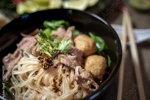 Thai style noodle blood soup,boat noodle,delicious dish,famous Thai noodle soup. Thai peoples call Boat Noodles. Close up or selective focus 