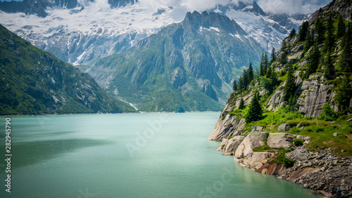 Beautiful lake in the glaciers of the Swiss Alps - nature of Switzerland