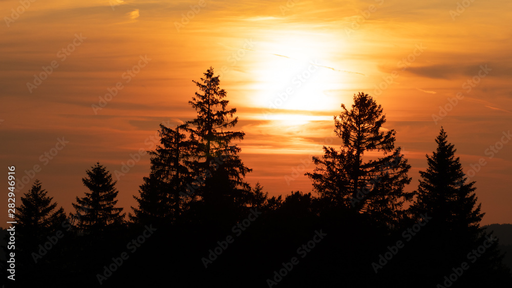 Beautiful sunset over farmlands in the Swiss Alps
