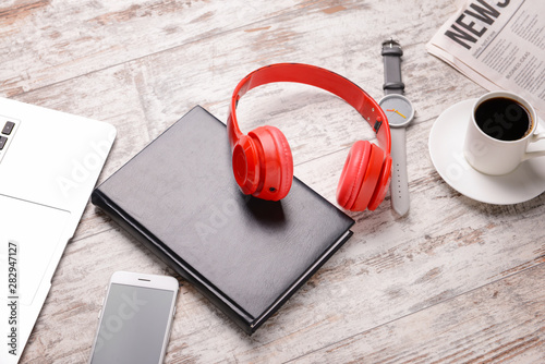 Modern headphones, notebook...