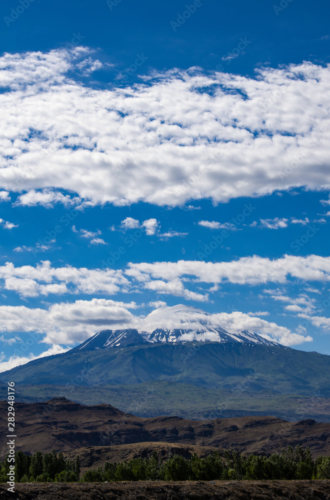Breathtaking view of Mount Ararat, Agri Dagi, the highest mountain in the extreme east of Turkey accepted in Christianity as the resting place of Noah's Ark, a snow-capped and dormant compound volcano Breathtaking view of Mount Ararat, Agri Dagi, the highest mountain in the extreme east of Turkey accepted in Christianity as the resting place of Noah's Ark, a snow-capped and dormant compound volcano