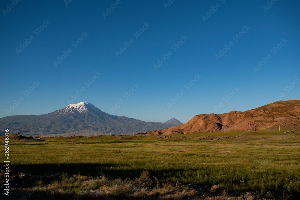 Breathtaking view of Mount Ararat, Agri Dagi, the highest mountain in the extreme east of Turkey accepted in Christianity as the resting place of Noah's Ark, a snow-capped and dormant compound volcano