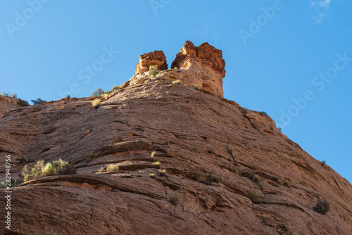 Capitol Reef National Park low angle landscape of barren bare rock mountain against the sky