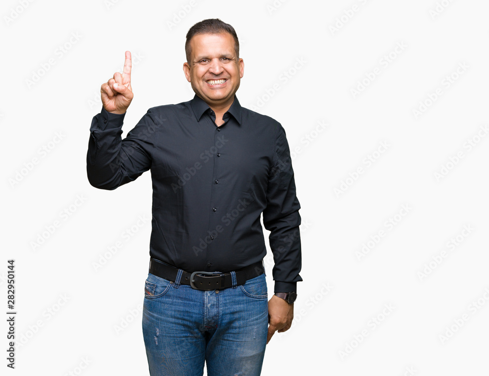 Handsome middle age arab business man over isolated background showing and pointing up with finger number one while smiling confident and happy. Handsome middle age arab business man over isolated background showing and pointing up with finger number one while smiling confident and happy.