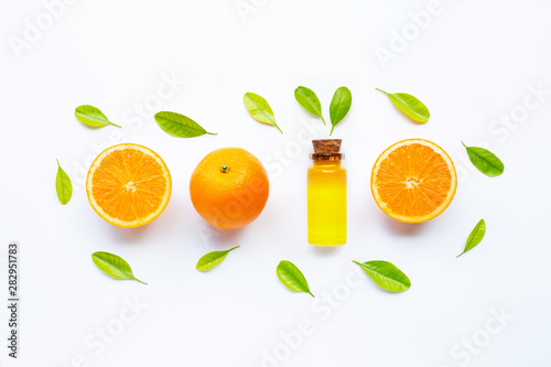 Citrus fruits oil natural orange Vitamin C with fresh orange and green leaves on white