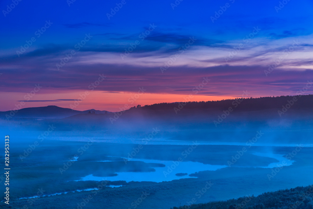 Foggy River at Sunrise