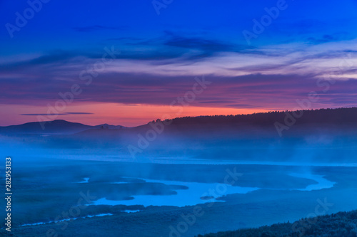 Foggy River at Sunrise