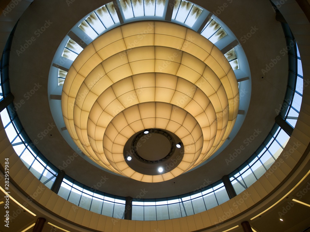 A huge hanging soft colored skylight