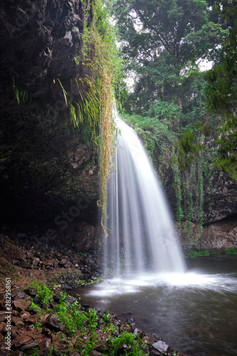 Killen falls Byron Bay hinterland in full flow with cave