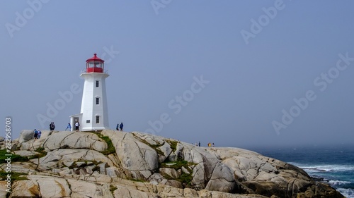 lighthouse on coast of sea