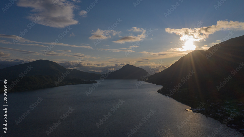 Orsta Norway cityscape. Panoramic aerial view from drone at sunset in july 2019 Orsta Norway cityscape. Panoramic aerial view from drone at sunset in july 2019