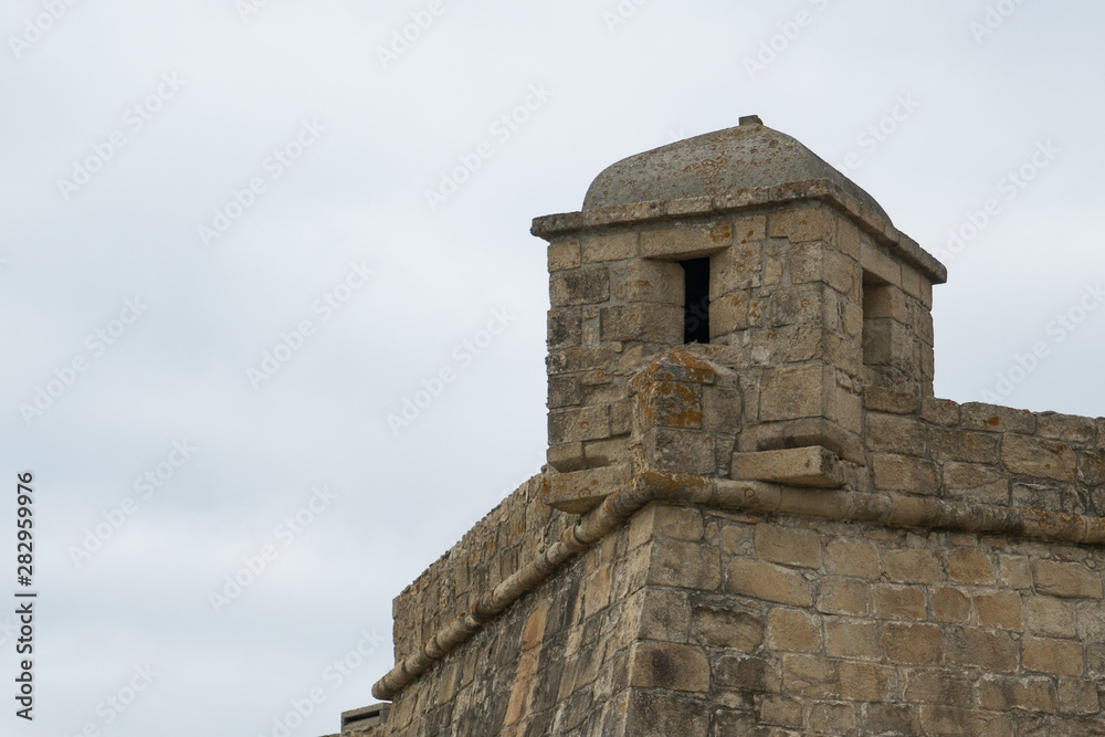 Corner turret of historic 17th century stone fort in Vila do Conde, Portugal. Fort of John the Baptist / Joao Batista.
