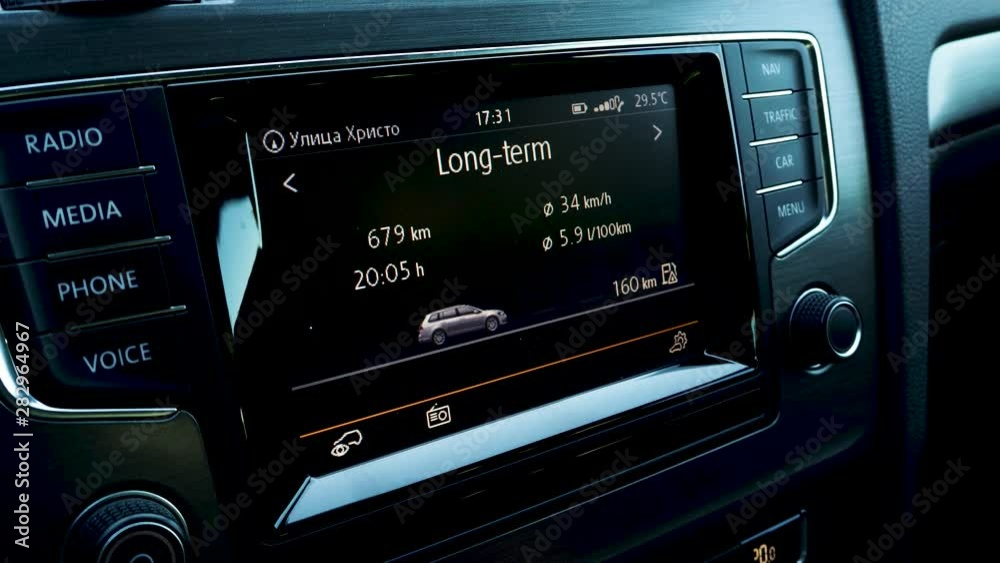 Man checking consumption, Car Dashboard, Instruments, Consumption, Eco tip, Ecology, rotating, Smart car, Car settings Man checking consumption, Car Dashboard, Instruments, Consumption, Eco tip, Ecology, rotating, Smart car, Car settings