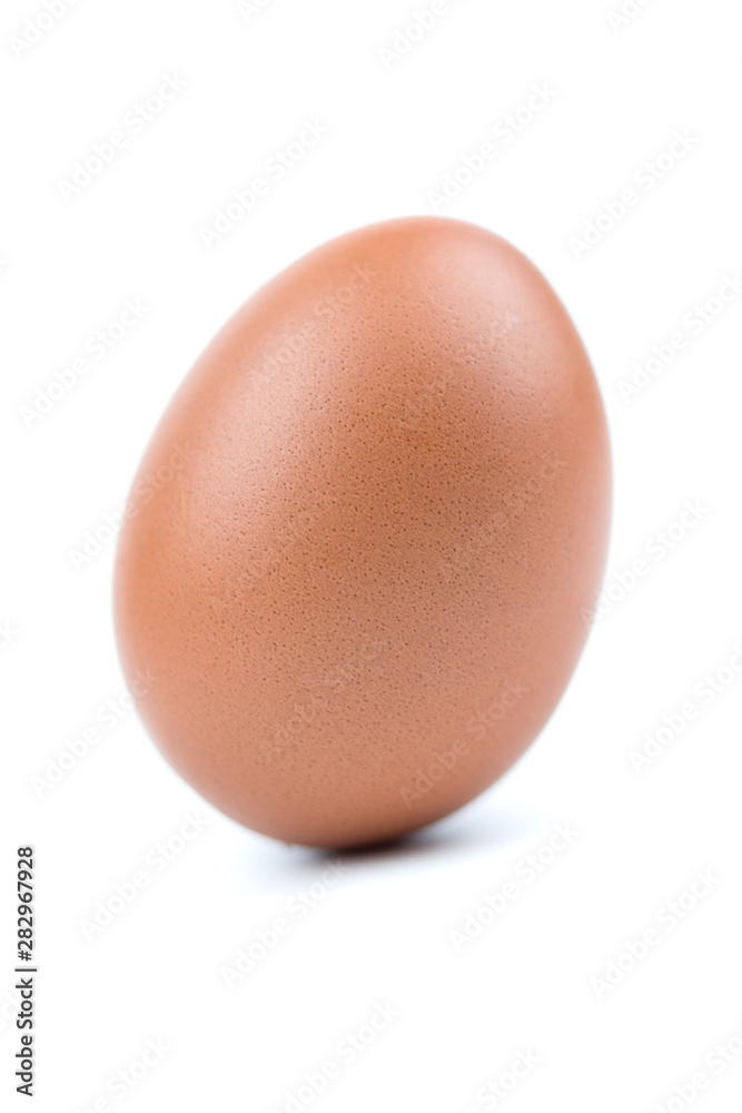 Single brown eggs isolated from white background. Single brown eggs isolated from white background.