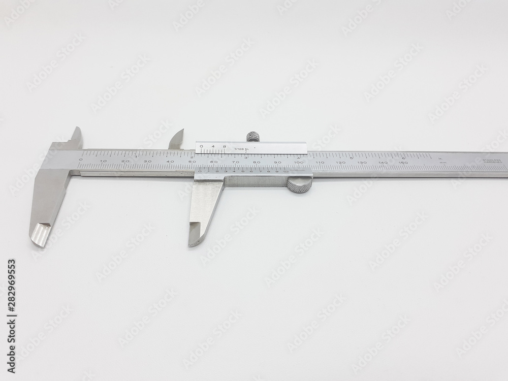 White Silver Metallic Calliper for Engineering Precision Scale Measurements in White Isolated Background White Silver Metallic Calliper for Engineering Precision Scale Measurements in White Isolated Background