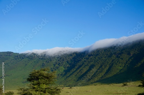 Clouds coming over the ridge of the Ngorongoro crater