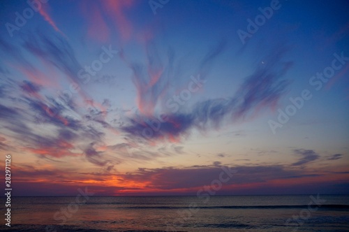 Sunrise over the ocean © Jennifer