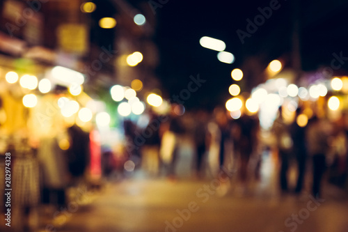 Blur with bokeh of night market at the city © pandaclub23