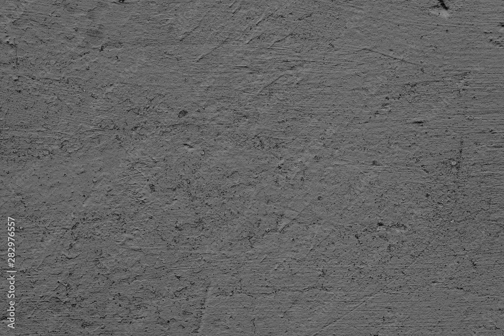 Texture of a concrete wall with cracks and scratches which can be used as a background Texture of a concrete wall with cracks and scratches which can be used as a background