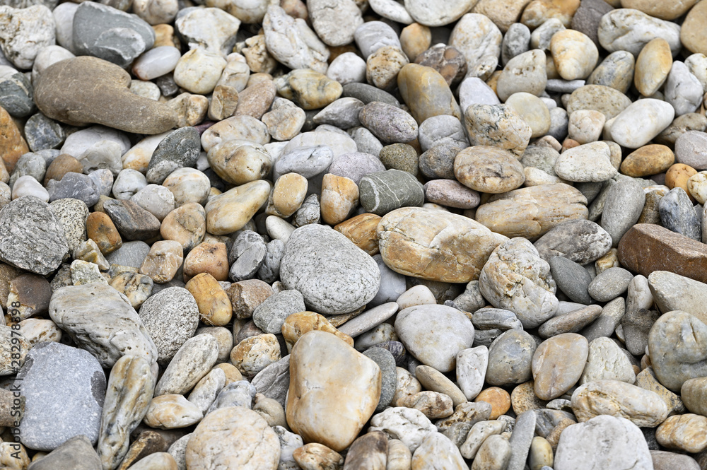 Colorful machined stones on the ground.