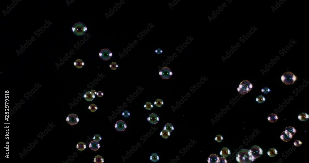 Rainbow soap bubbles on a dark background Rainbow soap bubbles on a dark background