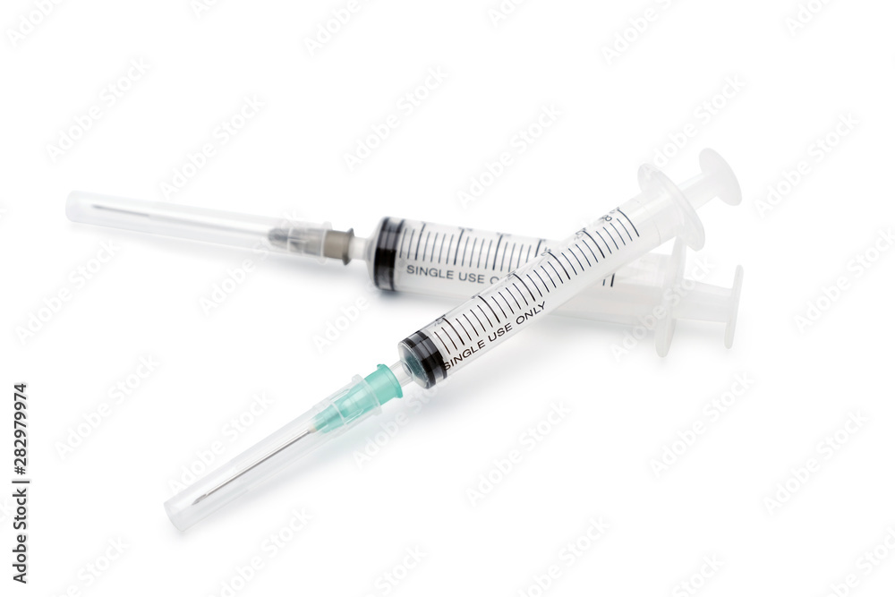 Blank plastic syringe with injection needle isolated on white background Blank plastic syringe with injection needle isolated on white background
