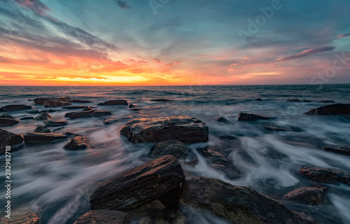 Seascape with rocks during sunrise. Stunning natural seascape. Sea sunrise at the Black Sea coast.
