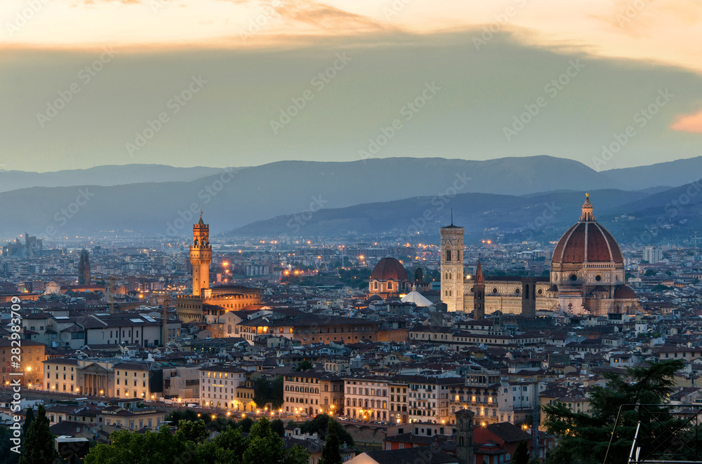  Panorama of evening Florence. Sunset in Italy. Duomo - Santa Maria del Fiore. Cheap hotels in Florence, Tuscany, Italy.