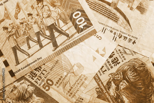 Different Hong Kong dollars bills close up. Retro style money background