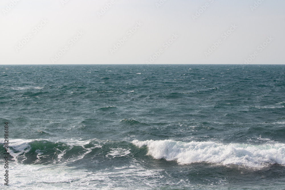 Seascape with sea horizon and cloudy sky - Background Seascape with sea horizon and cloudy sky - Background