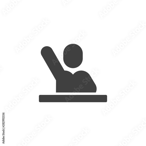 Pupil with a raised hand at the table vector icon. filled flat sign for mobile concept and web design. Studying, student glyph icon. Learning symbol, logo illustration. Vector graphics
