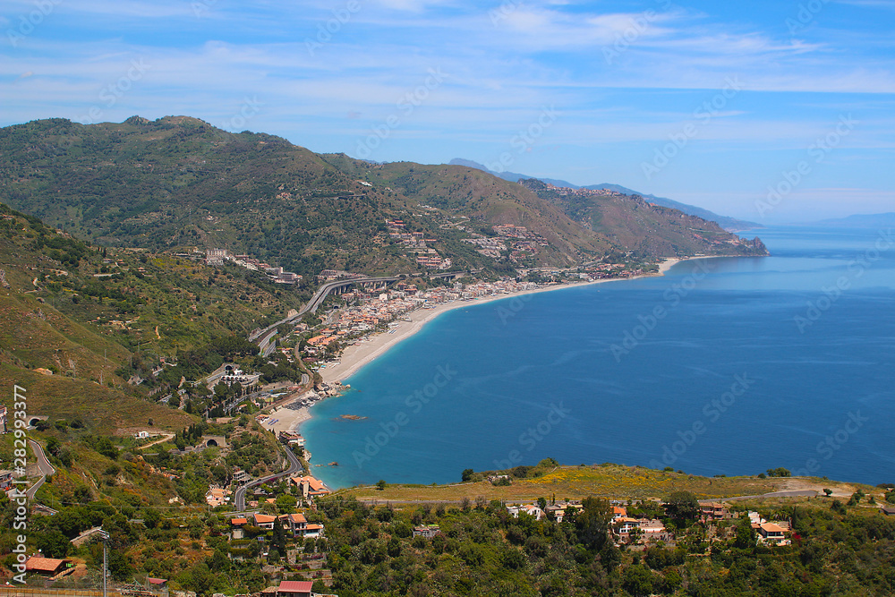 Aerial view at the Taormina coast and the highway to Messina on the island of Sicily, Italy