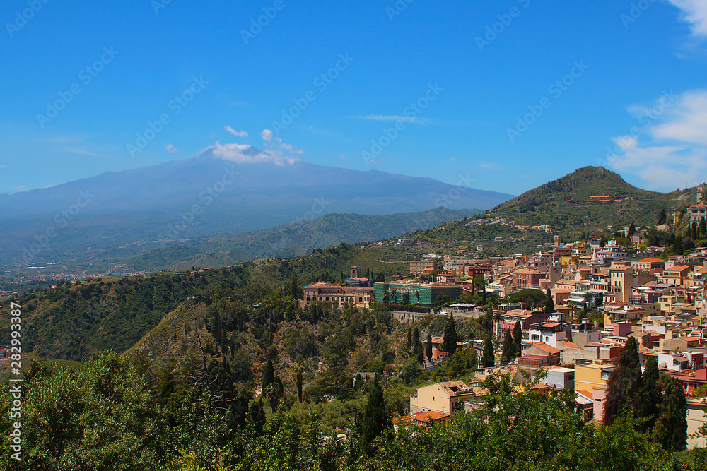 View over Taormina to the Volcano Etna on the island of Sicily, Italy