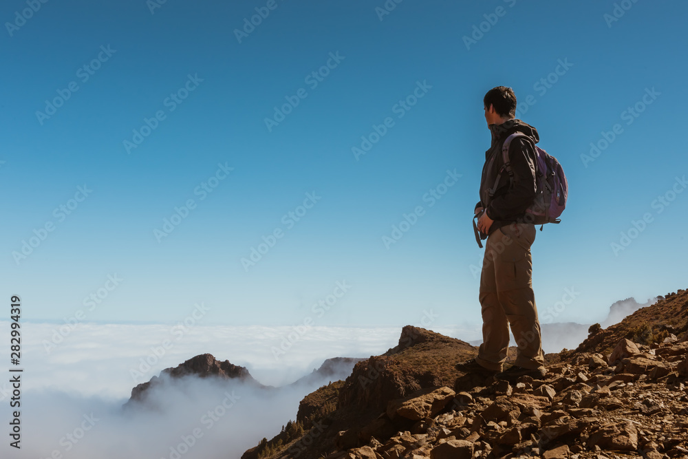 sport man on top of mountain achievement success healthy lifestyle, Tenerife Canary