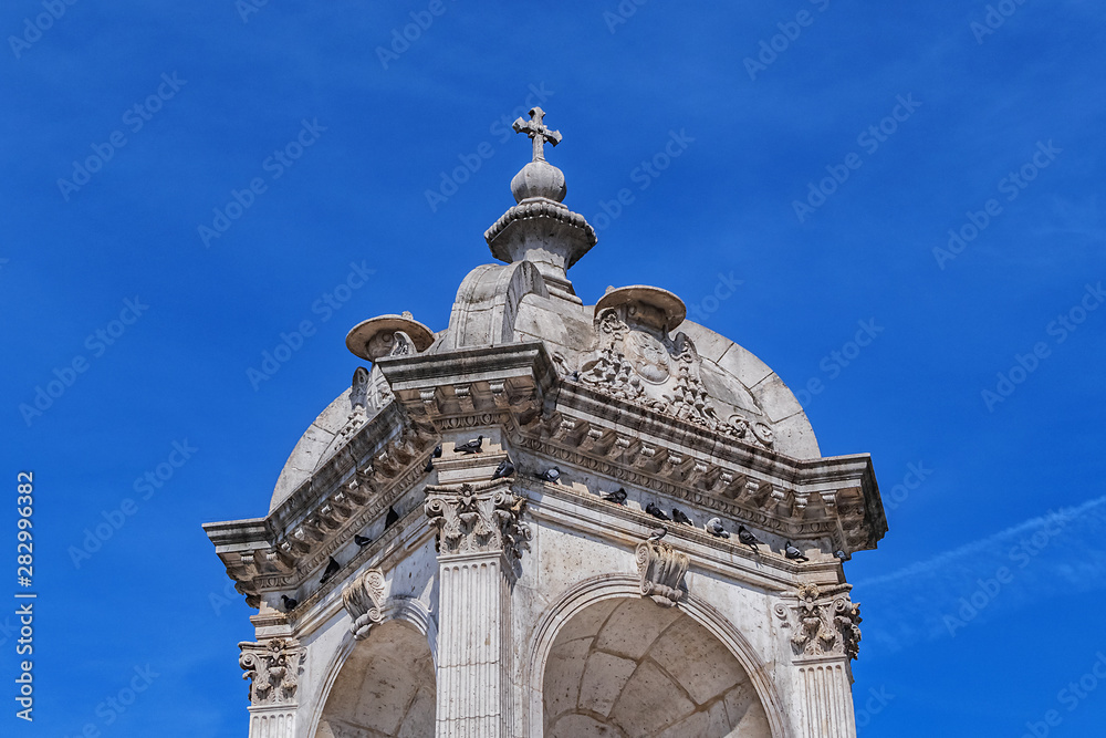Fototapeta premium Paris Fontaine Saint-Sulpice (or Orateurs-Sacre Fontaine, 1843 - 1848) - monumental fountain in Place Saint-Sulpice. Fountain figures represent French religious figures of XVII century. Paris, France.